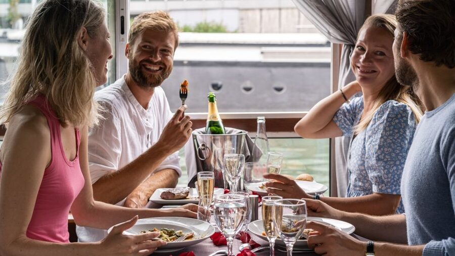 Paris: Early Evening Dinner Cruise on the River Seine - Dinner begins as Paris lights up
