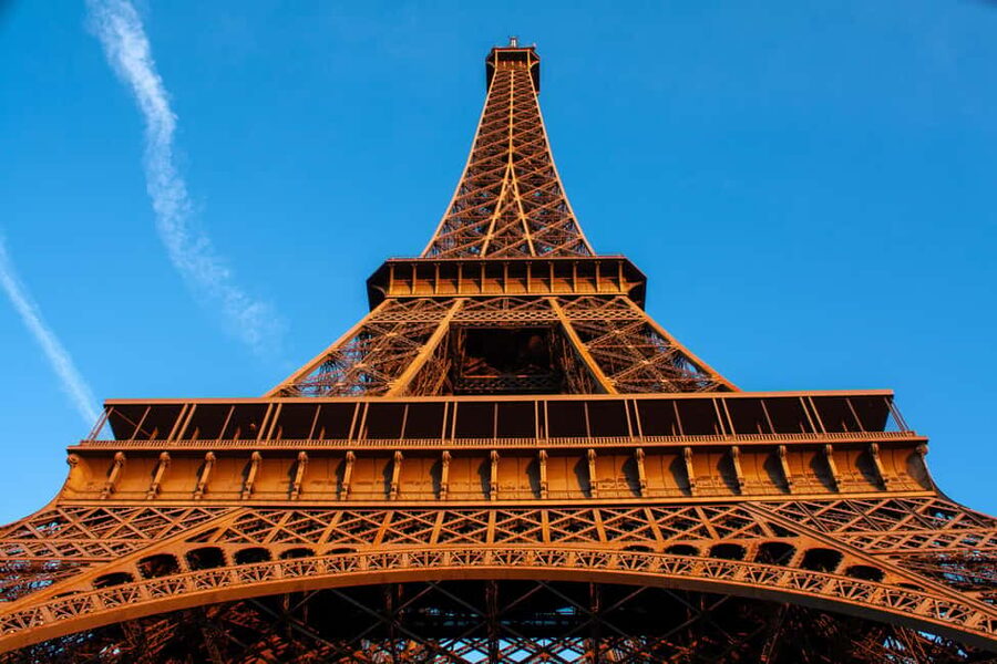 Paris: Eiffel Tower Fully Guided Tour with Summit Option - Reaching the second floor by elevator