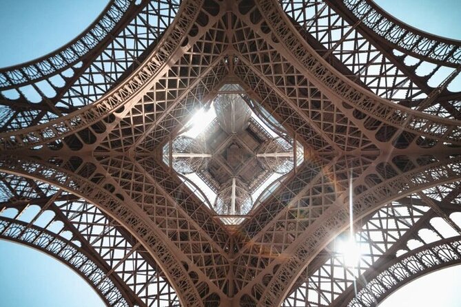 Paris: Eiffel Tower Summit Small-Group Guided Tour Max 6 People - Entering the tower and riding to the second level