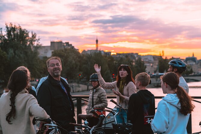 Paris Evening City of Lights Small Group Bike Tour & Boat Cruise - Notre Dame and the riverfront