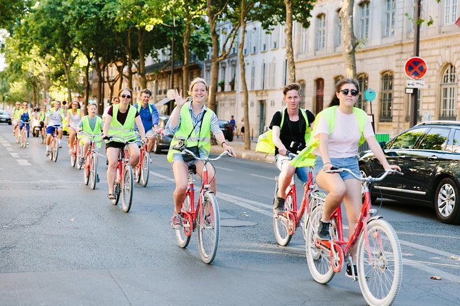 Paris Evening Snapshot Bike Tour - Riding Past the Louvre and the Seine