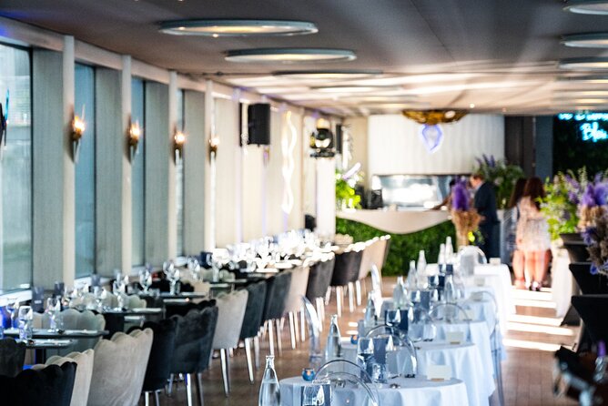 Paris Gourmet Dinner Seine River Cruise with Singer and DJ Set - Île Saint-Louis and Notre-Dame from the river