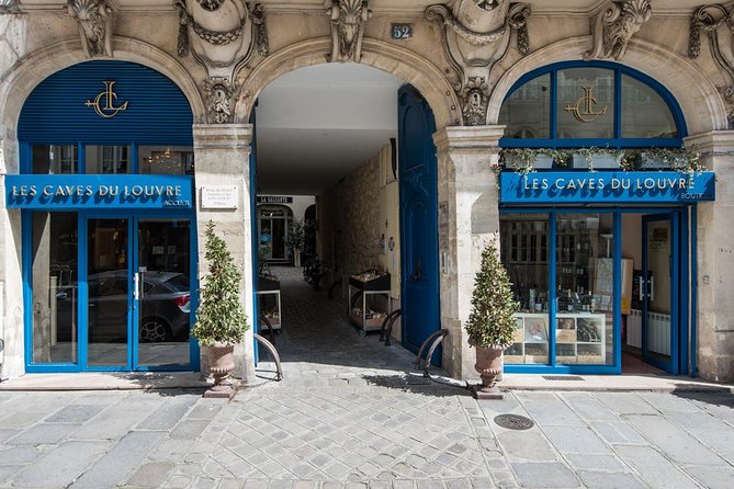 Paris - Guided Visit & Tasting in a Royal Wine Cellar - Entering Les Caves du Louvre on Rue de l’Arbre Sec