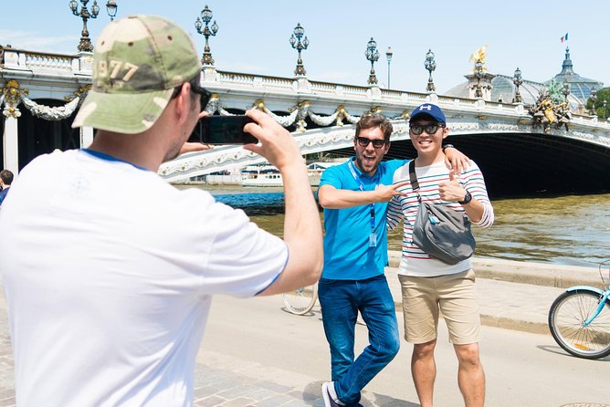 Paris Highlights Bike Tour: Eiffel Tower, Louvre and Notre-Dame - Rue Cler gives the tour a welcome pause