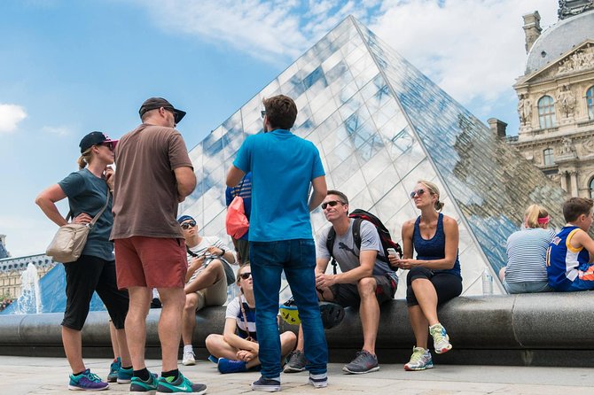 Paris Highlights Bike Tour: Eiffel Tower, Louvre and Notre-Dame - Along the Seine to Place de la Concorde