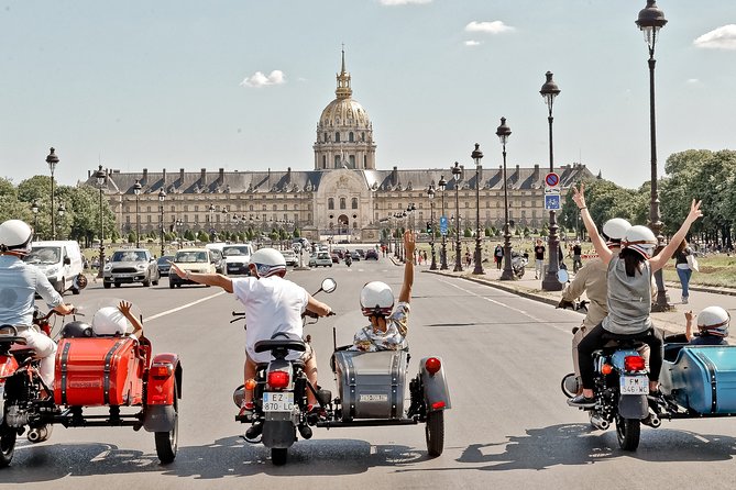Paris Highlights city tour on a vintage Sidecar Motorcycle - Starting at Place Saint-Michel beside the Seine