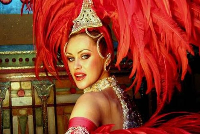 Paris Illuminations Tour with Moulin Rouge Show and Cruise Option - Arriving in Montmartre for Féerie