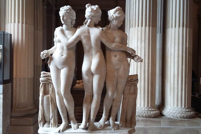 Paris: Louvre Museum Tour Mona Lisa & Iconic Masterpieces - Winged Victory of Samothrace on the grand staircase