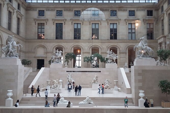 Paris: Louvre Museum Tour Mona Lisa & Iconic Masterpieces - Meeting at the Kiosque des Noctambules