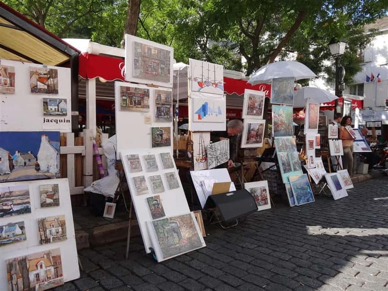 Paris Montmartre: 2-Hour City Tour in German - Lapin Agile and the old village atmosphere