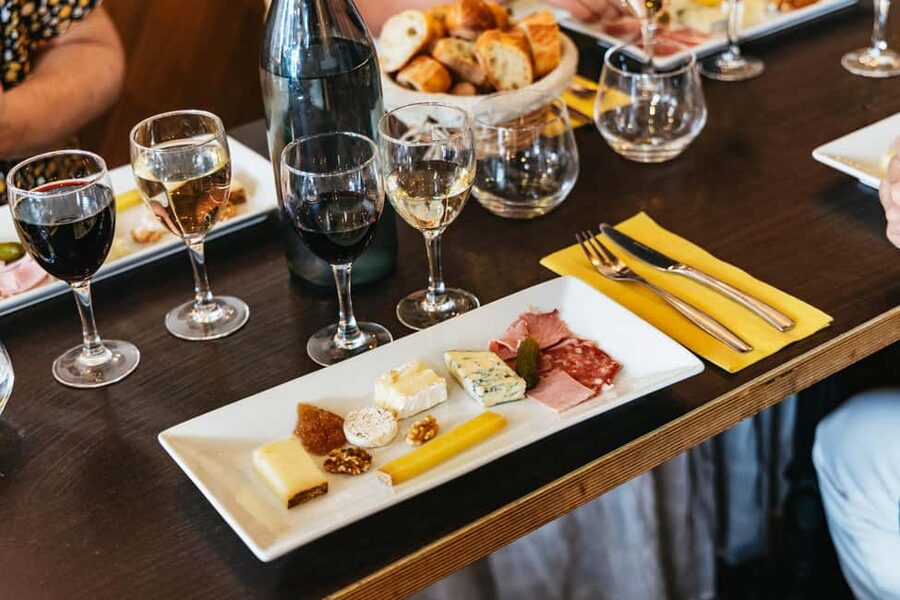 Paris: Montmartre Cheese, Wine & Pastry Guided Walking Tour - Cheese, charcuterie, and wine in Montmartre