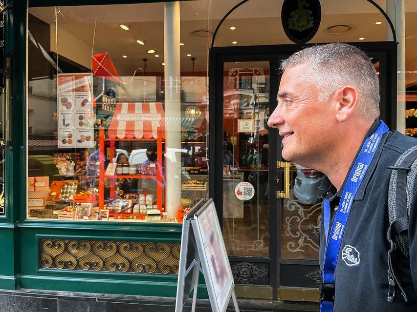 Paris: Montmartre Cheese, Wine & Pastry Guided Walking Tour - Walking through the artists’ Montmartre