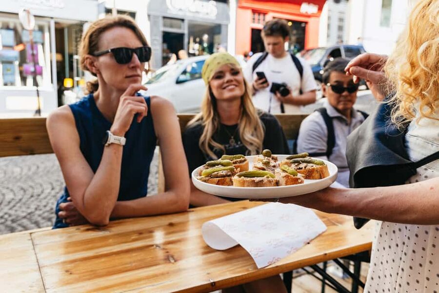 Paris: Montmartre Cheese, Wine & Pastry Guided Walking Tour - Place du Tertre and the famous white basilica