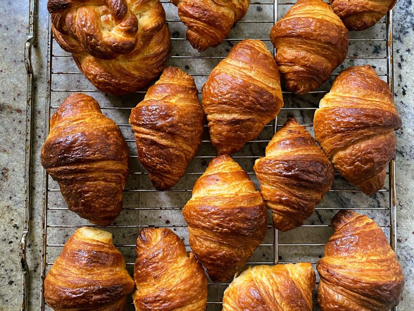 Paris: Montmartre Culture and Local Pastries Walking Tour - Walking down toward the Moulin Rouge