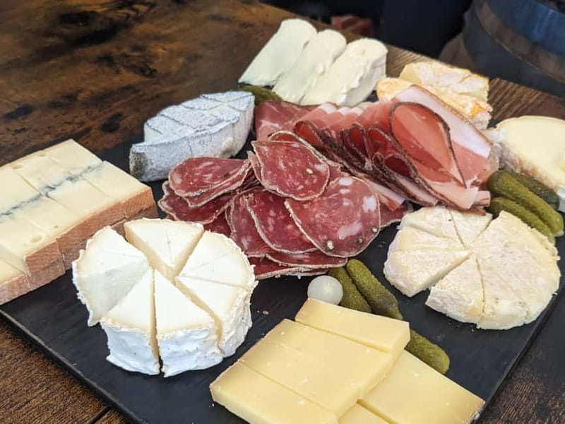 Paris: Montmartre/Pigalle Foodie Tour with Tastings - Charcuterie, cheeses, and the French welcome