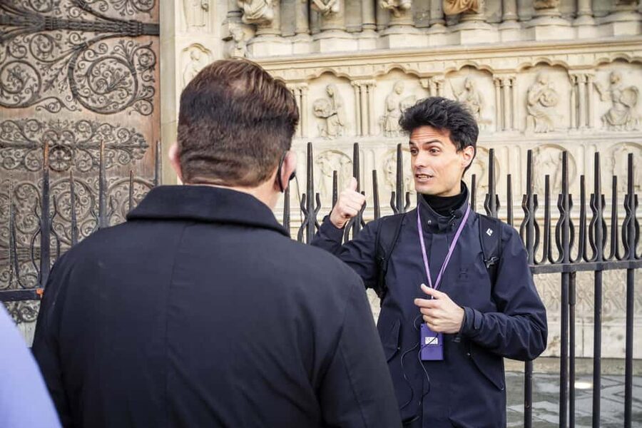 Paris: Notre Dame and Île de la Cité Walking Tour - The island walk and its royal connections