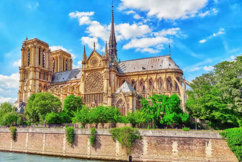 Paris: Notre-Dame Cathedral Exterior Tour & Free Entrance - The Gothic façade, gargoyles, and carved details