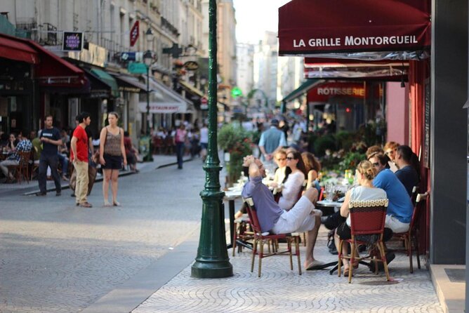 Paris Pastry Tour - Croissants, Macarons & Iconic French Desserts - Starting at Victoire Boulangerie with pain au chocolat