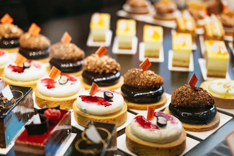 Paris: Saint Germain des Prés Guided Foodie Walking Tour - Cafés, churches, and the famous Saint Germain route