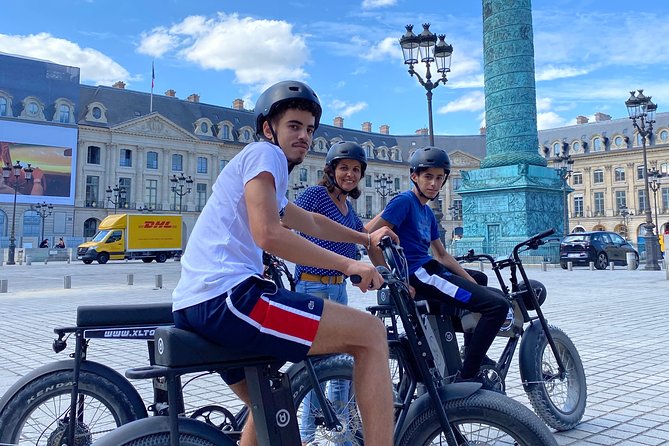 Paris Sightseeing Family Friendly Guided Electric Bike Tour - The Louvre from the Carrousel