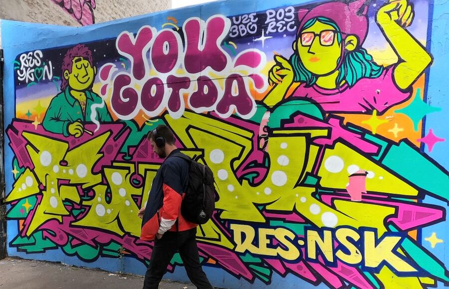 Paris: Street Art Open-Air Museum Bike Tour - Reading the giant murals instead of just photographing them