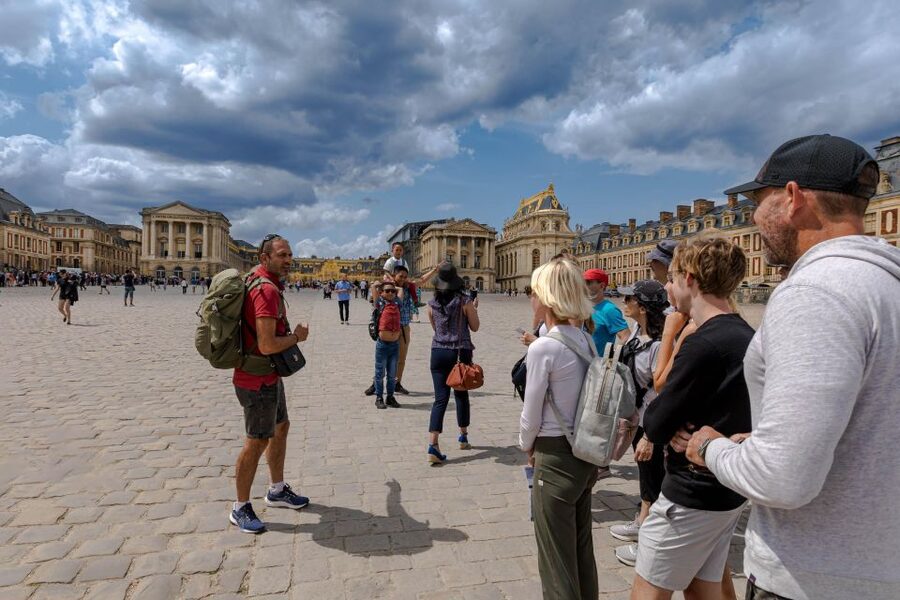 Paris: Versailles Palace and Queen Hamlet E-Bike Tour - Notre-Dame Market turns lunch into part of the tour