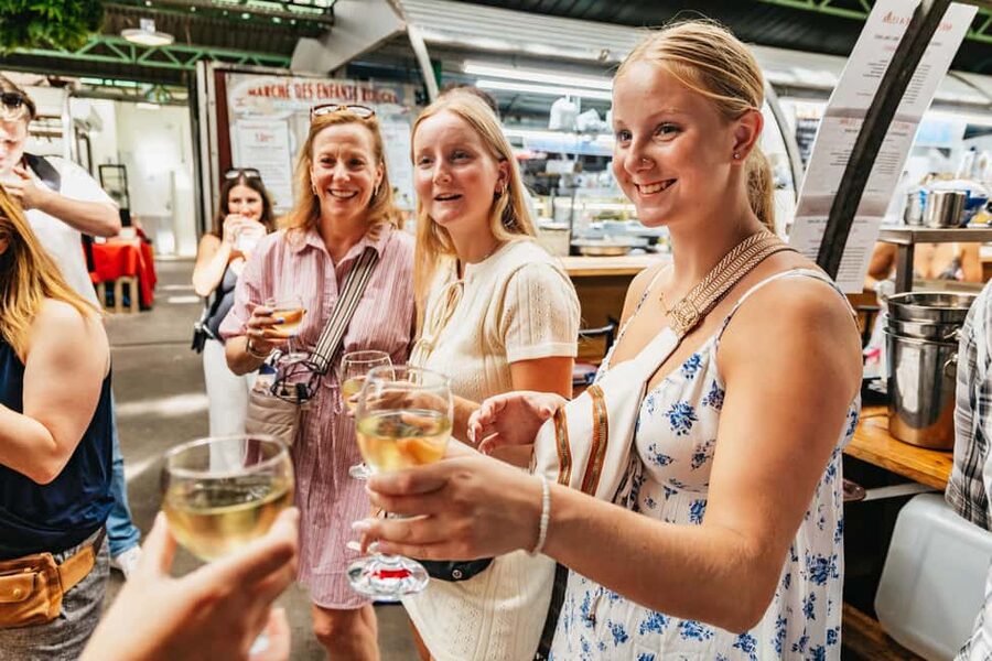 Paris: Walking Food Tour with Cheese, Wine and Delicacies - Cheese, baguette, and the French way of tasting