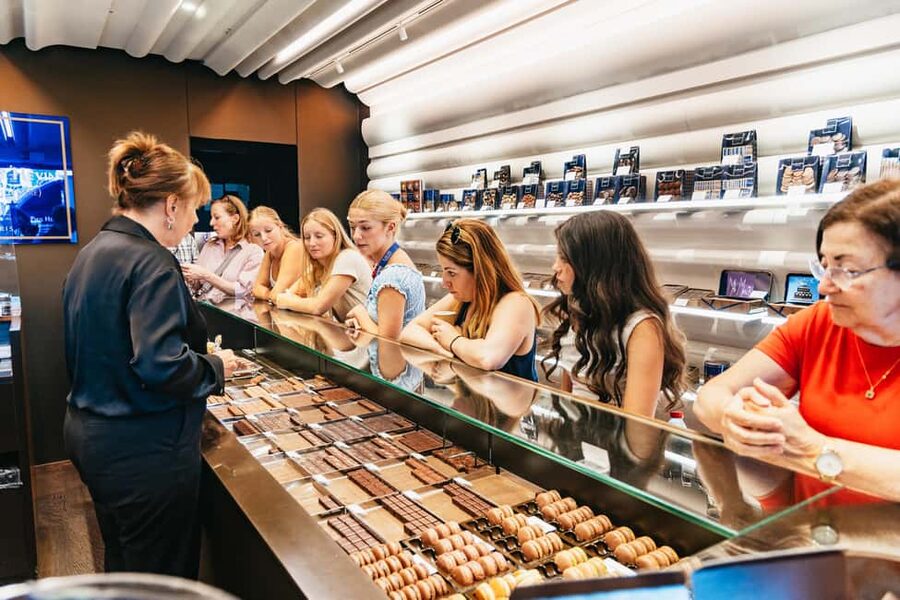 Paris: Walking Food Tour with Cheese, Wine and Delicacies - Charcuterie, ham, and a restaurant pause