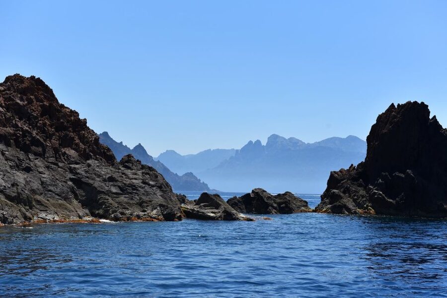 Porto: Scandola and Calanches of Piana Boat Trip - Entering the Scandola Nature Reserve