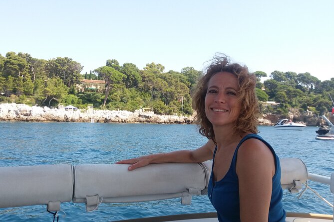 Private ride with sea bath in Solar Catamaran - Cap dAntibes, cliffs, pebbles, and clear water