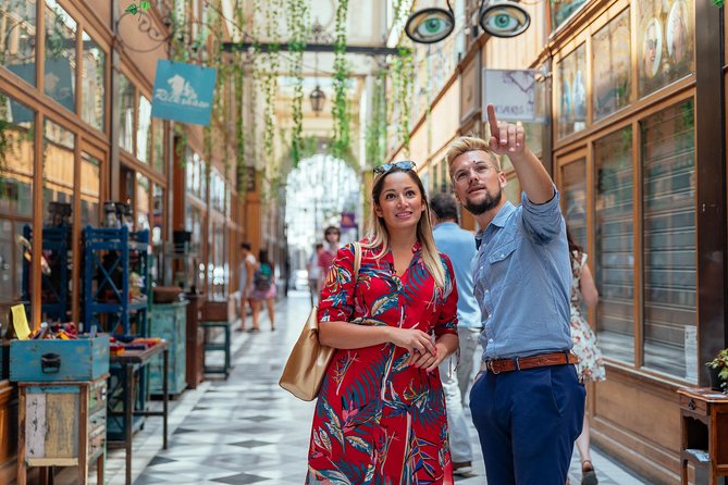PRIVATE TOUR: Highlights & Hidden Gems of Paris With Locals - Palais Royal, arcades, and Place des Victoires