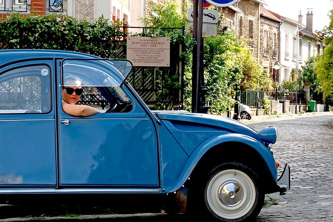 Private Tour of Paris in a convertible citroën 2CV - Circling the Arc de Triomphe at Place de l’Étoile