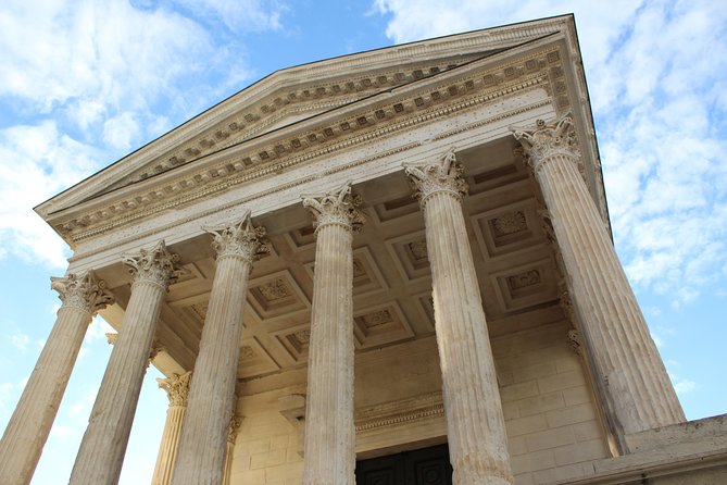 Roman Sites and Historical Places Day Trip from Avignon - Entering the Nîmes Arena