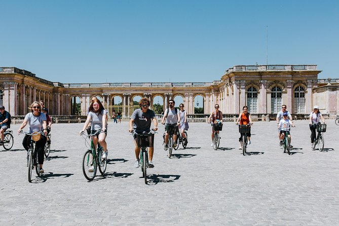 Versailles Domain Bike Tour with Palace Entry by Train from Paris - Weather, equipment, and physical demands