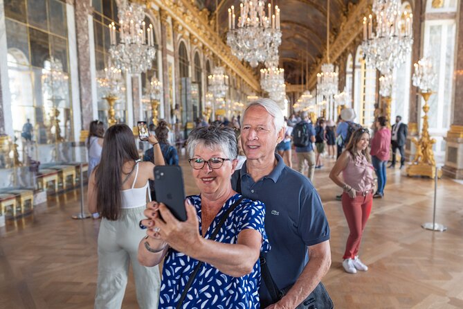 Versailles Palace and Gardens Tour by Train from Paris - Walking the French-style gardens