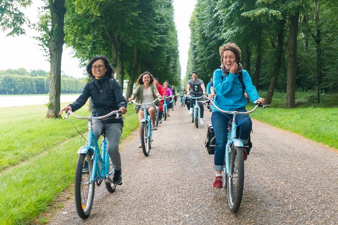 Versailles Palace Bike Tour with Market & Marie-Antoinette hamlet - Apollo Fountain and the royal message